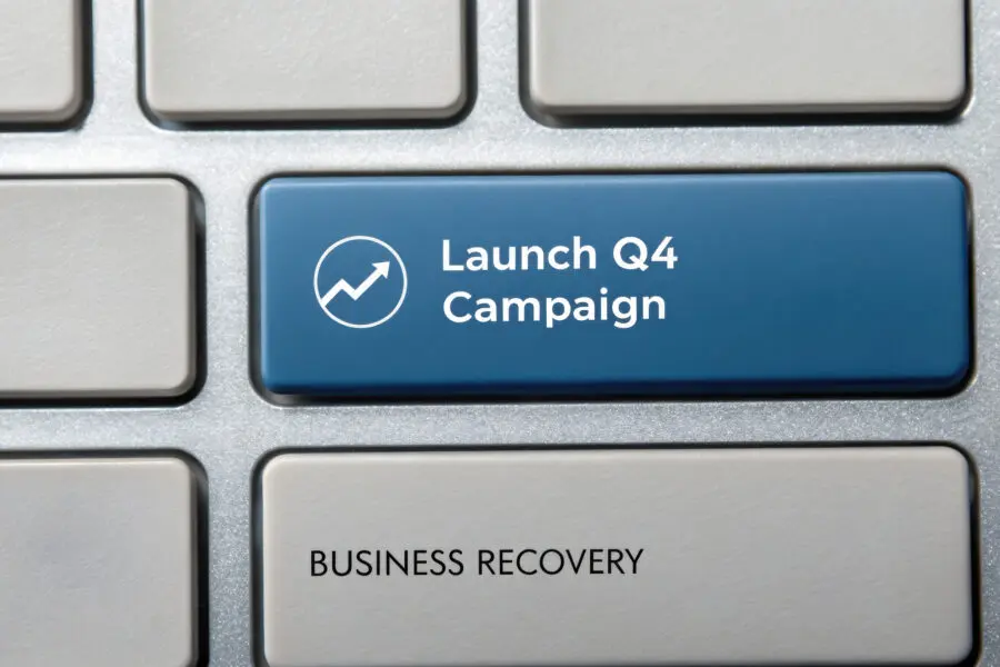 Launch Q4 campaign button on keyboard symbolizes business recovery strategy. Business Recovery
