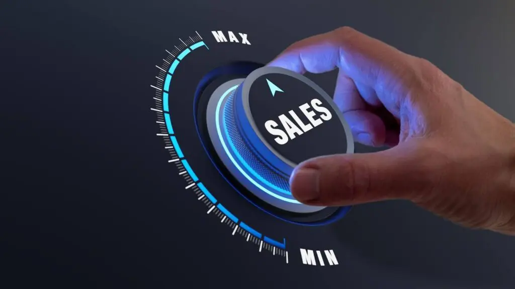 man pushing sales button