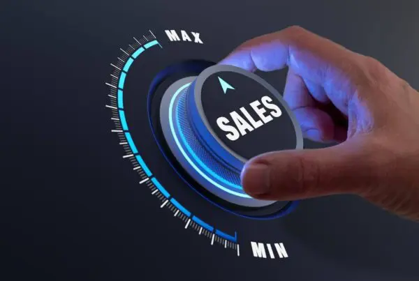 man pushing sales button