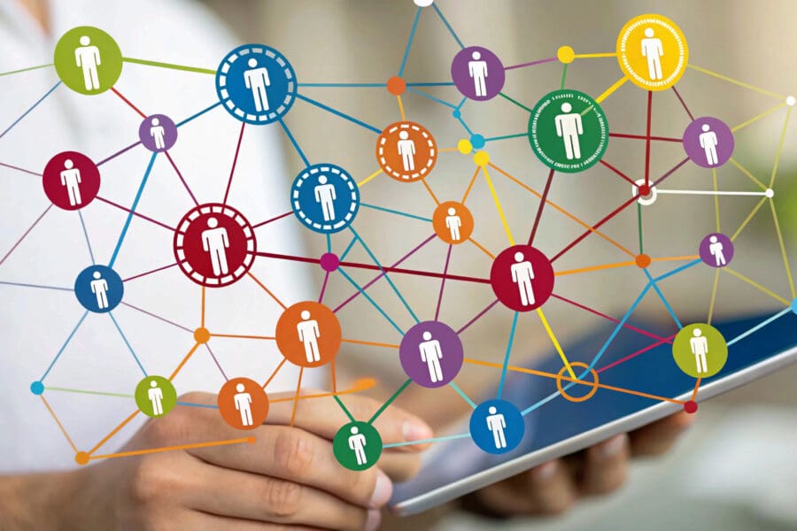 social network concept connection Colorful figures linked by lines depict the complex web of relationships in a community.